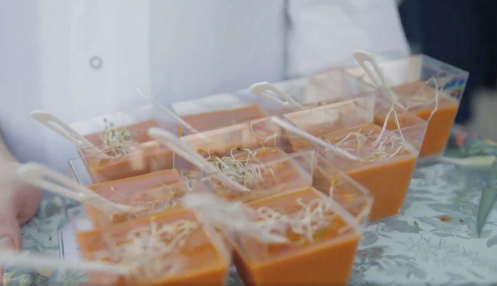 A set of plastic cups filled with food for the Botanist office catering